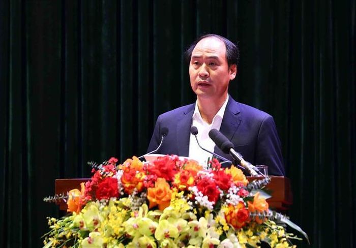 Thứ trưởng Bộ Lao động, Thương binh và Xã hội Nguyễn Văn Hồi trình bày tham luận.