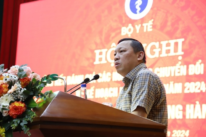 Ông Ngô Hải Phan - Cục trưởng Cục Kiểm soát thủ tục hành chính Văn phòng Chính phủ báo cáo tại hội nghị