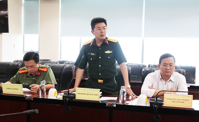 Đại biểu thảo luận tại cuộc họp
